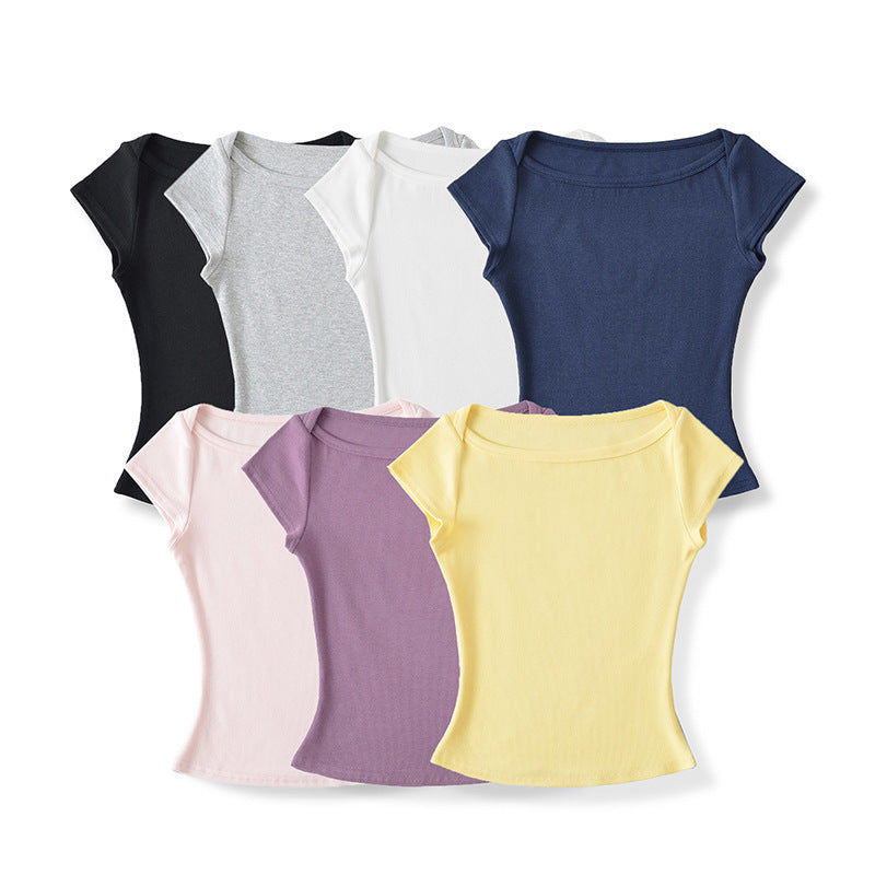 Woman wearing Elegant Short Sleeve Top in a stylish setting