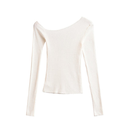 Woman wearing Slanted Shoulder Off Shoulder Slim Fit Top in a casual setting