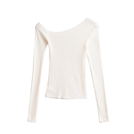 Woman wearing Slanted Shoulder Off Shoulder Slim Fit Top in a casual setting