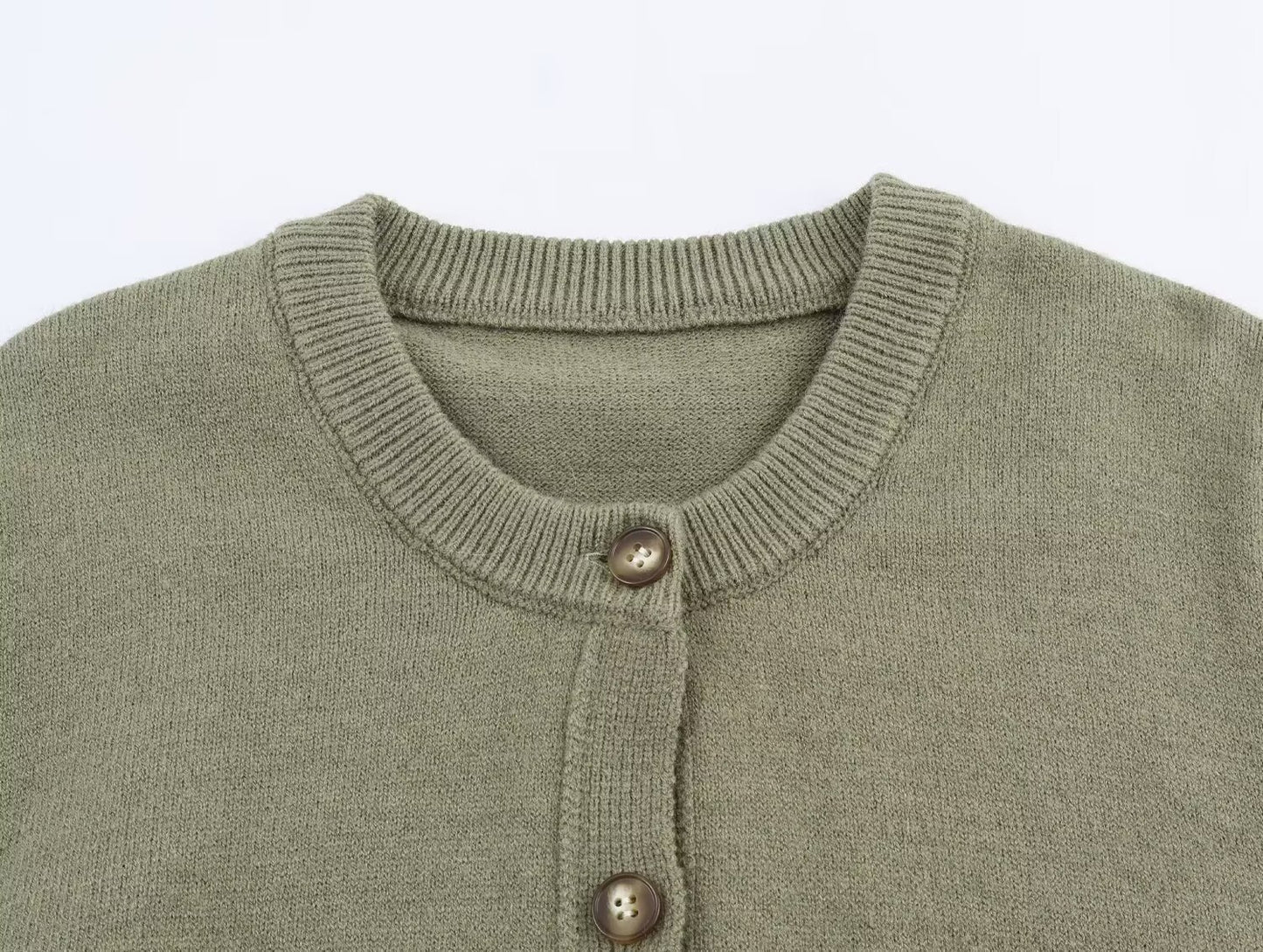 Woman wearing Round Neck Long Sleeved Knitted Cardigan Jacket in a stylish setting