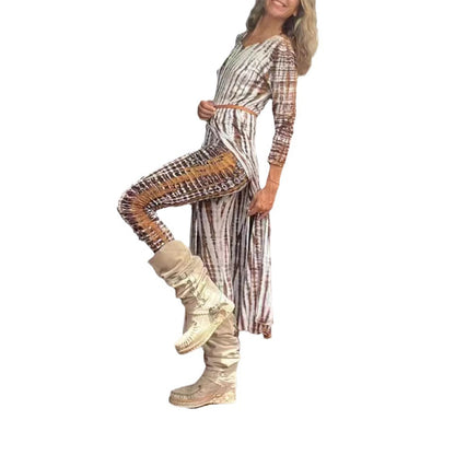 Woman wearing Burnout Print Slim Fit High-Waist Trousers in a chic urban setting