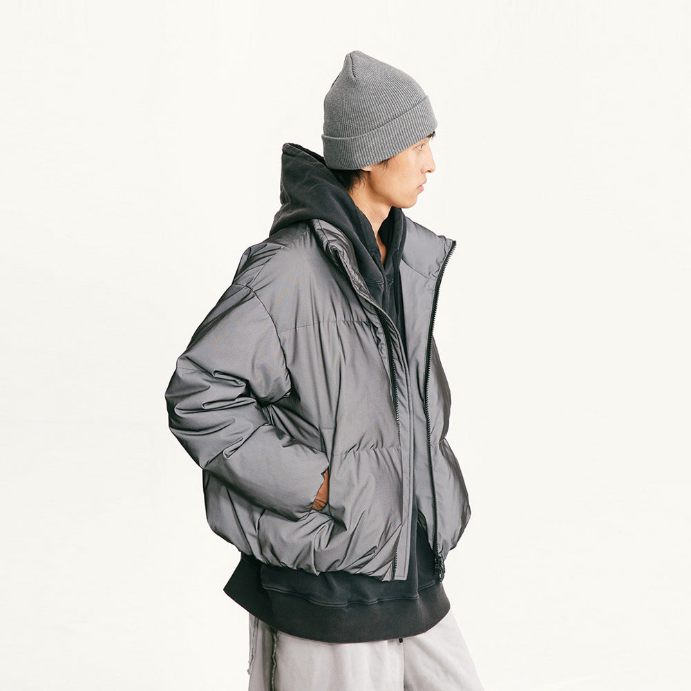 Woman wearing 3D Reflective Thickened Down Jacket in an urban setting