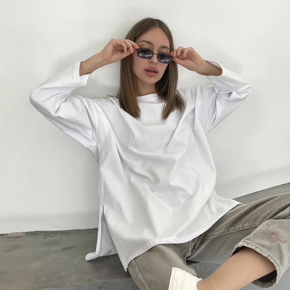 Woman wearing Loose Fit Long Sleeve Slit T-Shirt in a casual setting