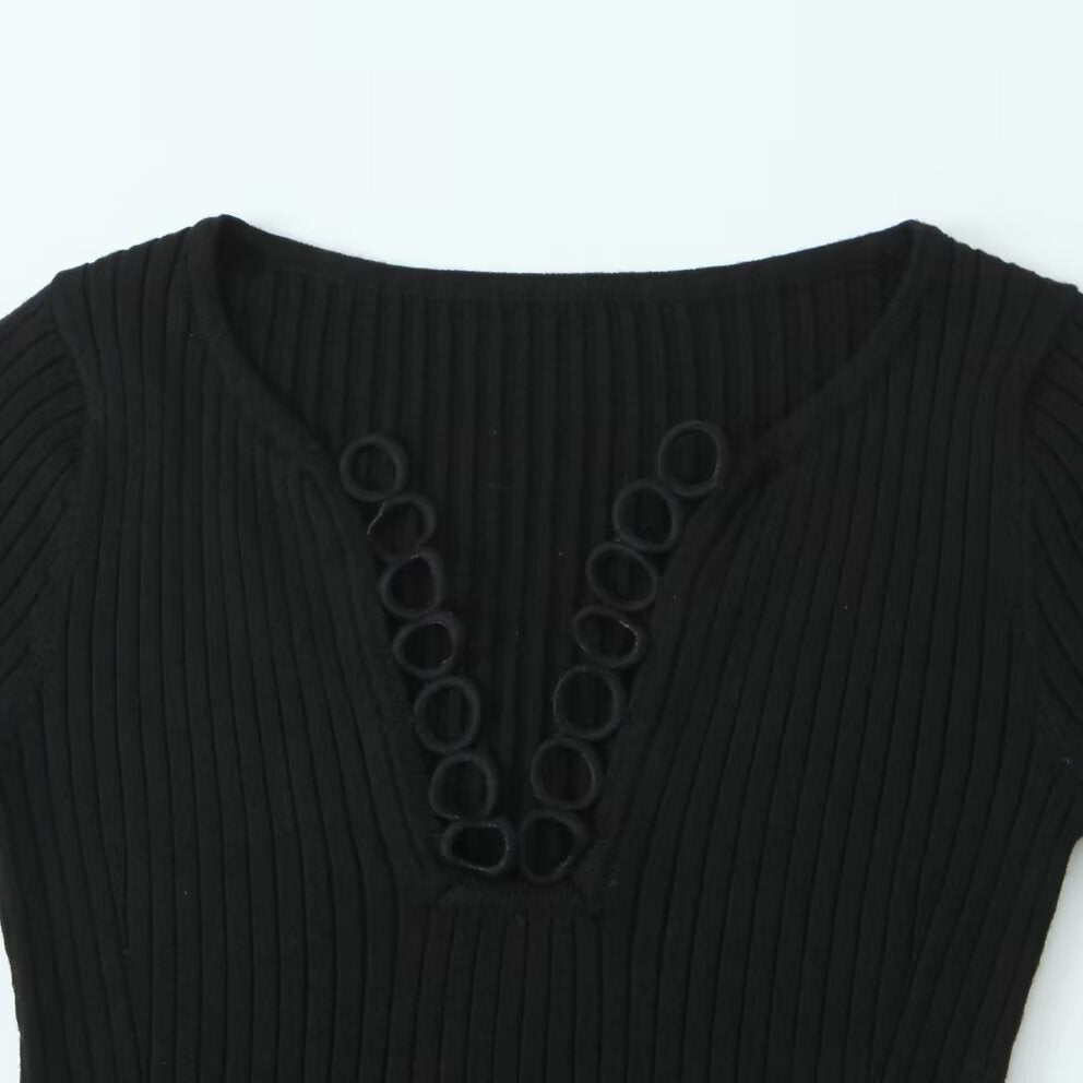 Woman wearing V-Neck Hollowed Out Slim Fit Top in a stylish setting