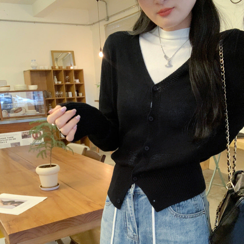 Woman wearing V-Neck Batwing Sleeve Knit Cardigan Coat in a stylish outdoor setting