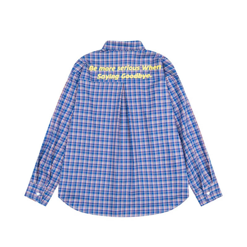 Woman wearing Embroidered Letter Plaid Shirt in a casual outdoor setting