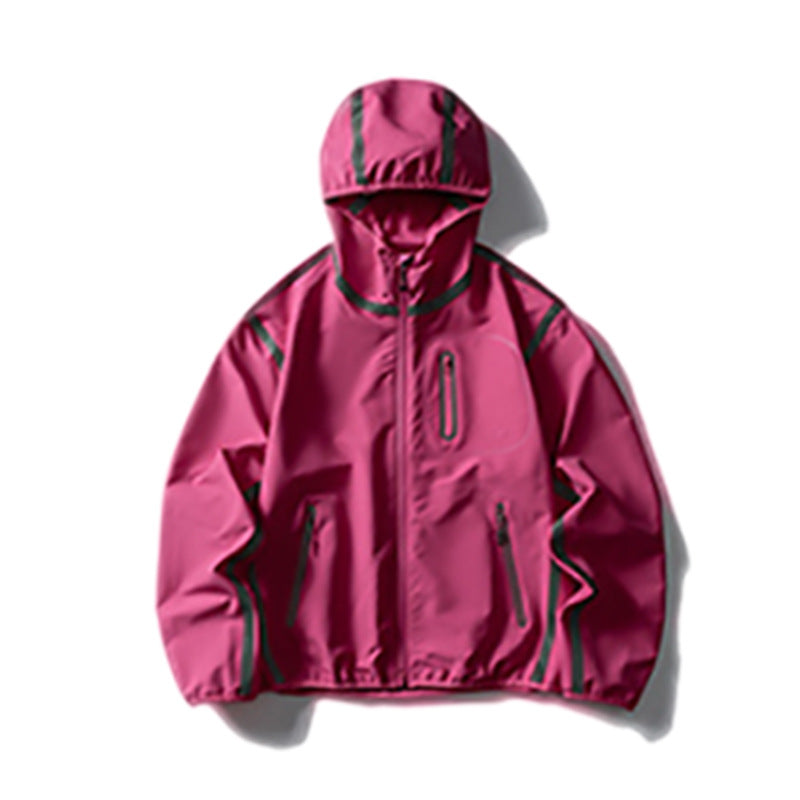 Woman wearing Reflective Strip Colour Block Hooded Jacket in an urban setting