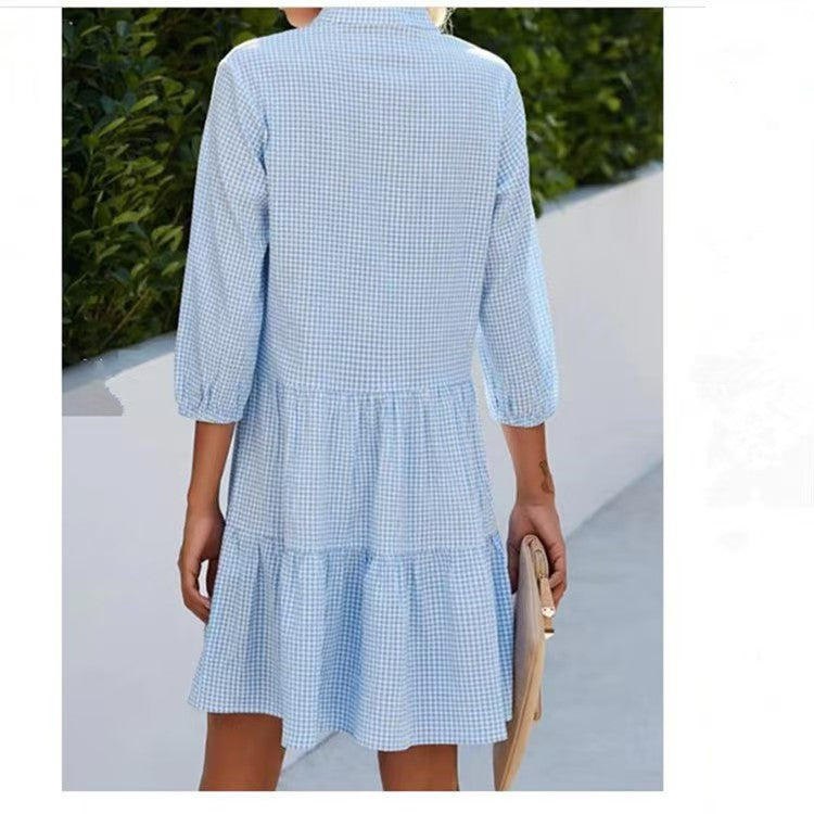 Woman wearing Chic Plaid Stand Collar Dress in a city setting