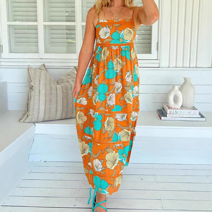 Woman wearing One-Shoulder Leaf Print Boho Maxi Dress in a sunny outdoor setting