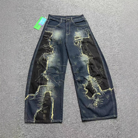 Washed Patch Curved Knife Jeans | Tajstylo