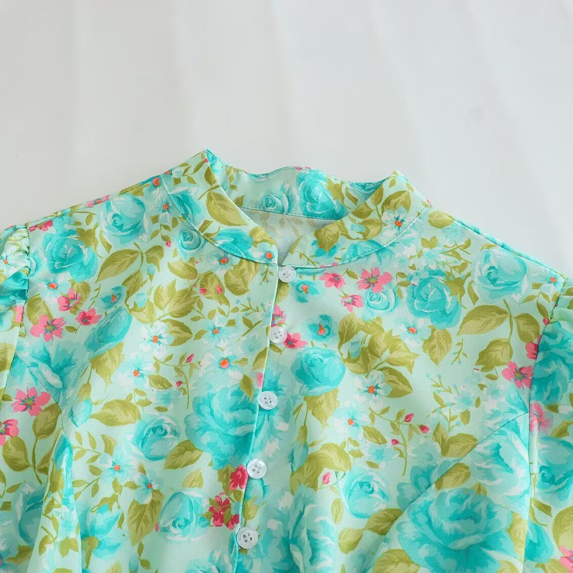 Woman wearing Casual Printed A-Line Dress with Long Sleeves in a sunny outdoor setting