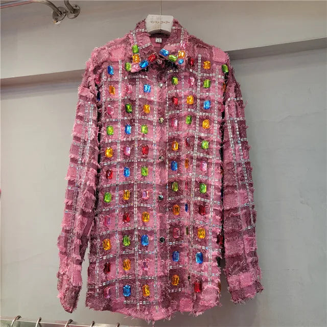 Woman wearing Colorful Studded Tassel Blouse in a casual setting