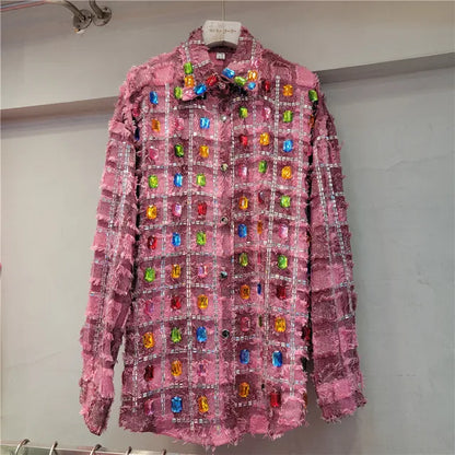 Woman wearing Colorful Studded Tassel Blouse in a casual setting