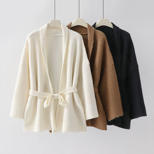 Woman wearing Loose Knitted Sweater for Women in a cozy indoor setting