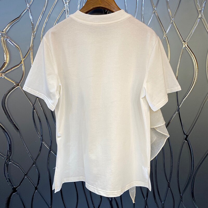 Woman wearing Patchwork Ruffle T-Shirt in a casual summer setting