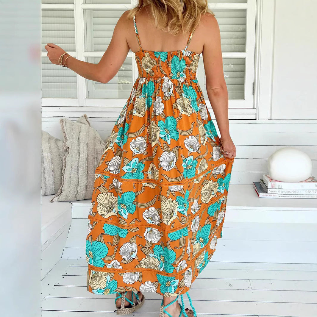Woman wearing One-Shoulder Leaf Print Boho Maxi Dress in a sunny outdoor setting