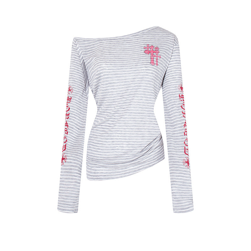 Woman wearing Stripe Graffiti Off Shoulder Long Sleeve Tee in an urban setting