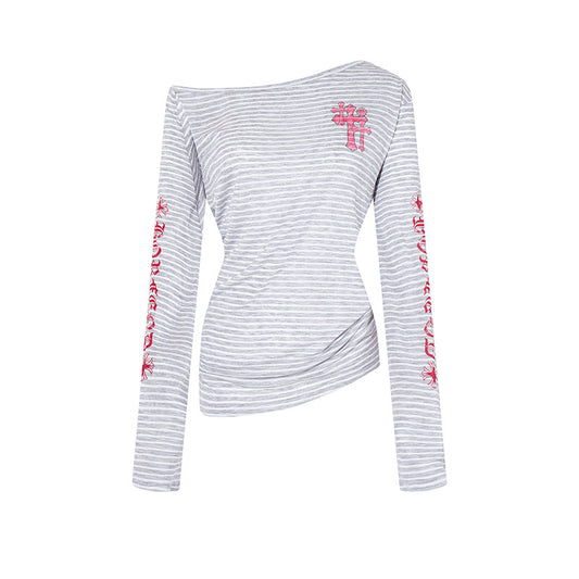 Woman wearing Stripe Graffiti Off Shoulder Long Sleeve Tee in an urban setting