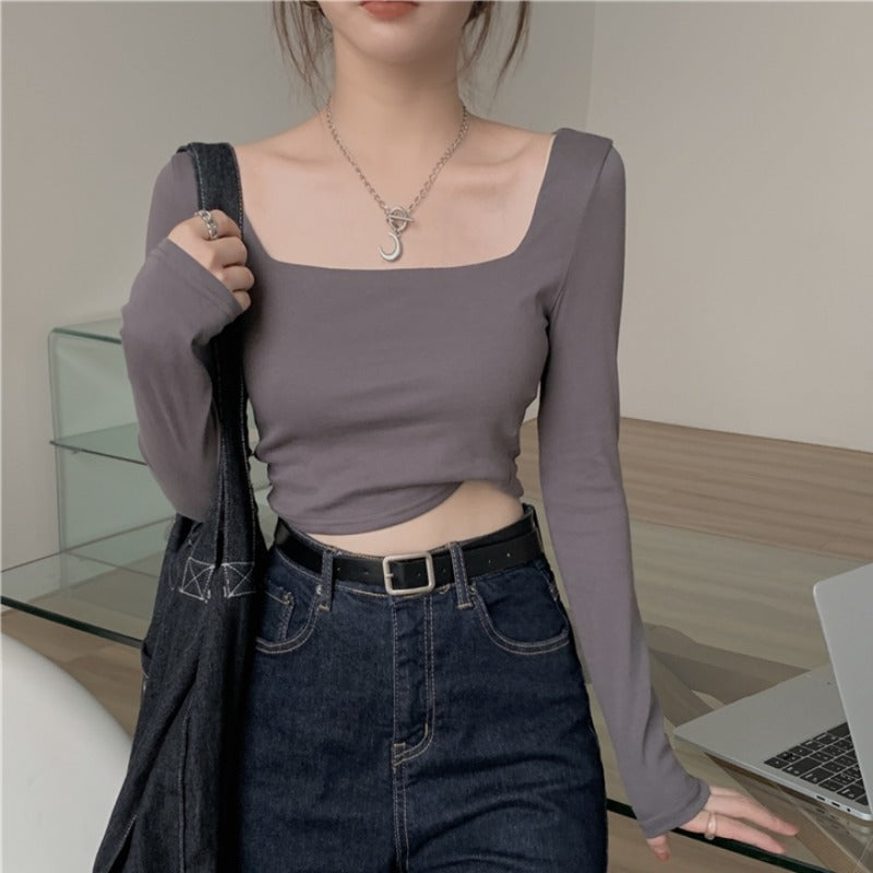 Woman wearing Slim Fit Long Sleeve Square Neck Top in a stylish setting
