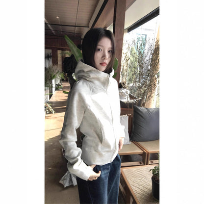 Woman wearing Hooded Sweatshirt for Women in a cozy outdoor setting
