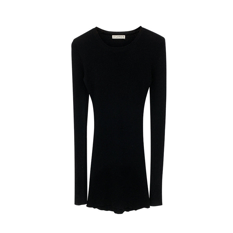 Woman wearing Slim Fit Wool Blend Long Sleeve Sweater in a cozy setting