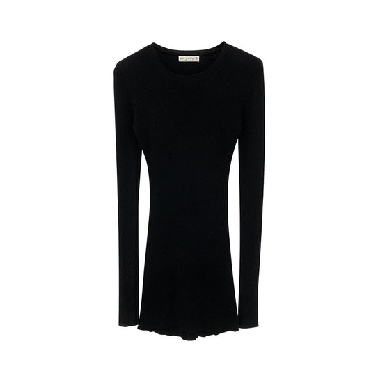 Woman wearing Slim Fit Wool Blend Long Sleeve Sweater in a cozy setting