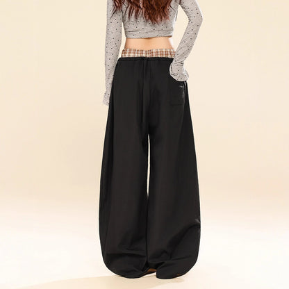 Woman wearing Plaid Patchwork Wide Leg Pants in a casual setting