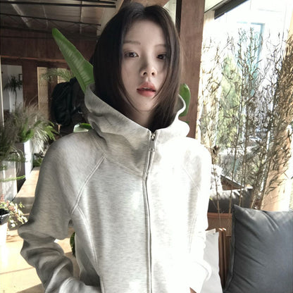 Woman wearing Hooded Sweatshirt for Women in a cozy outdoor setting