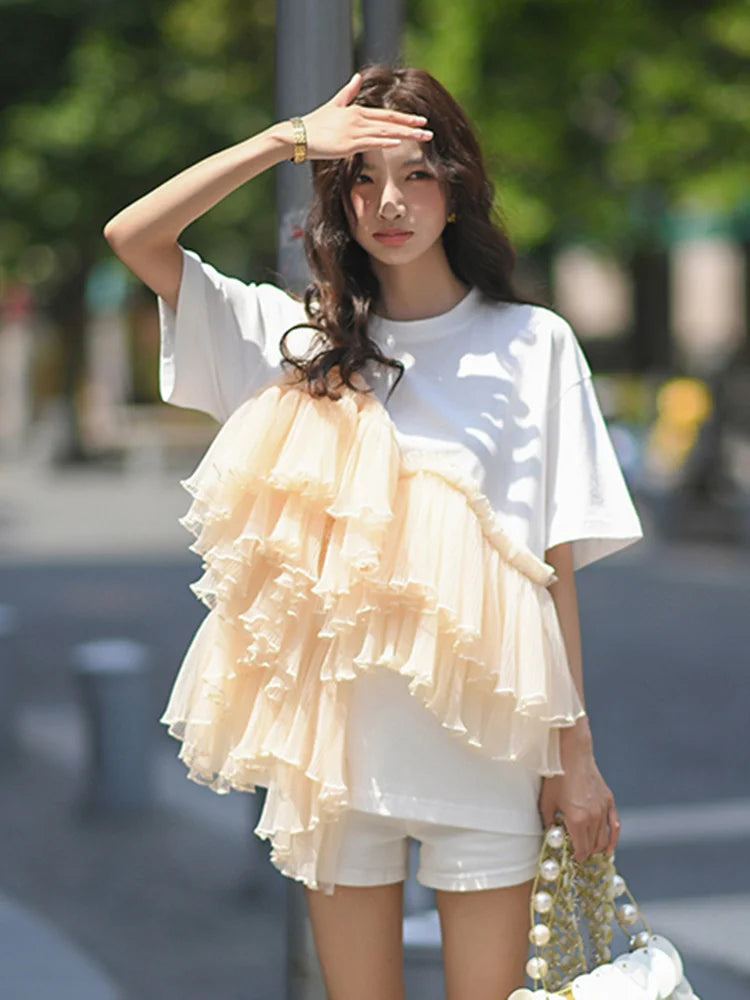 Woman wearing Cotton Mesh Patchwork Loose O Neck Short Sleeve T Shirt in a casual setting