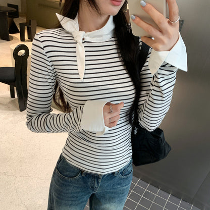 Woman wearing Women's Stripe Mock Neck Tie-Front Top in a stylish setting