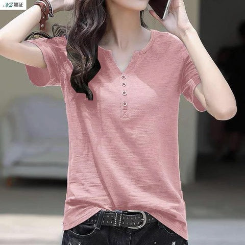 Woman wearing Loose Plus Size V-Neck Short Sleeve Casual T-Shirt in a casual setting