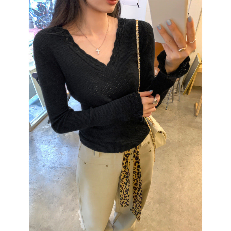 Woman wearing Slim Fit V-Neck Knit Top in a casual setting