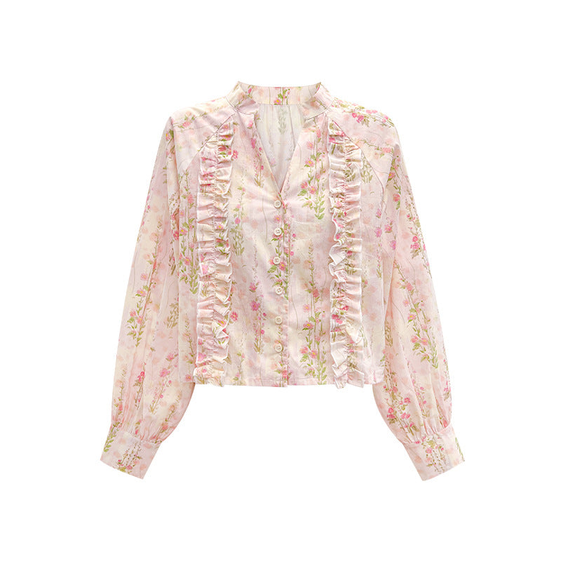 Woman wearing Floral Long Sleeve Shirt in a sunny outdoor setting