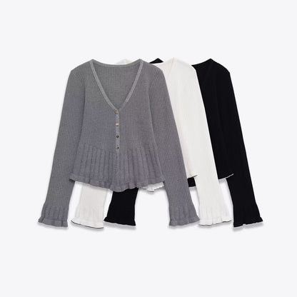 Woman wearing Slim Fit V-Neck Layered Top in a stylish setting