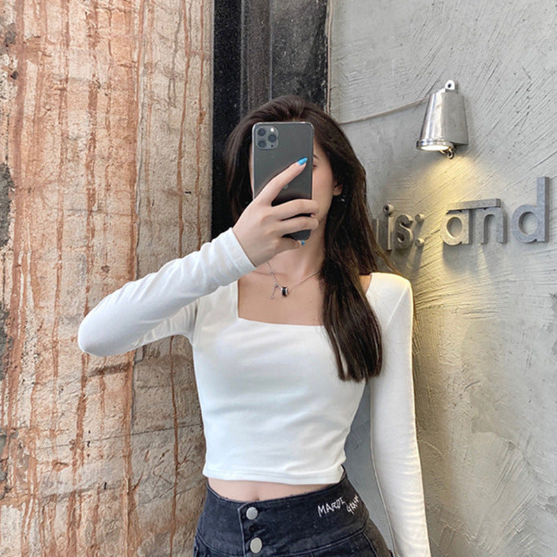 Woman wearing Slim Fit Round Neck Long Sleeve Basic T-Shirt in a casual setting