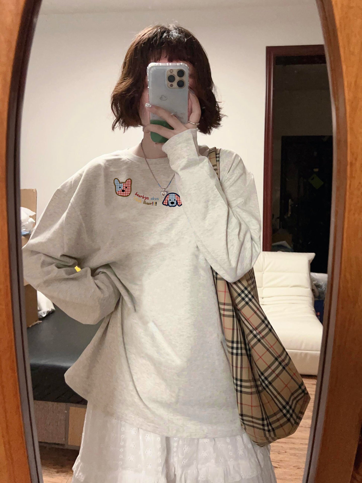 Woman wearing Geometric Pattern Long Sleeve Top in a casual setting