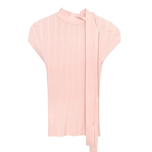 Woman wearing Slimming Sleeveless Top in a stylish setting