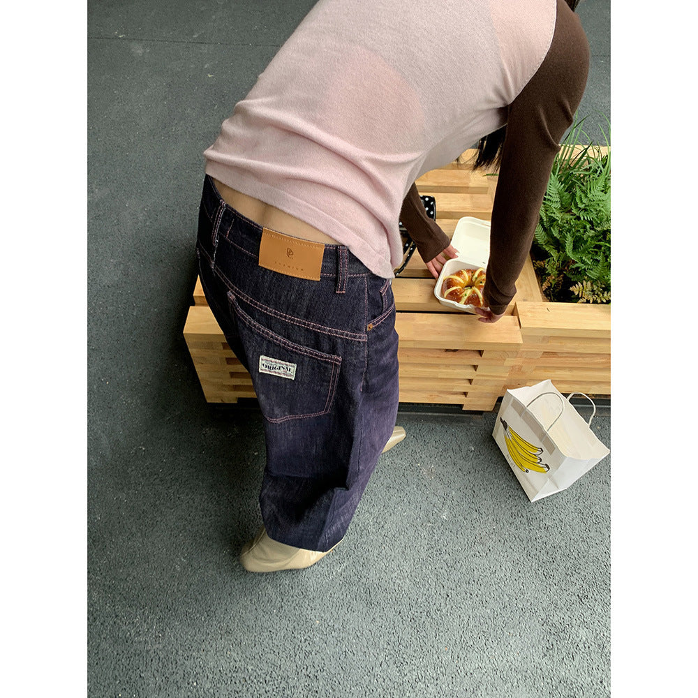 Woman wearing Retro Wide Leg Jeans in a casual setting