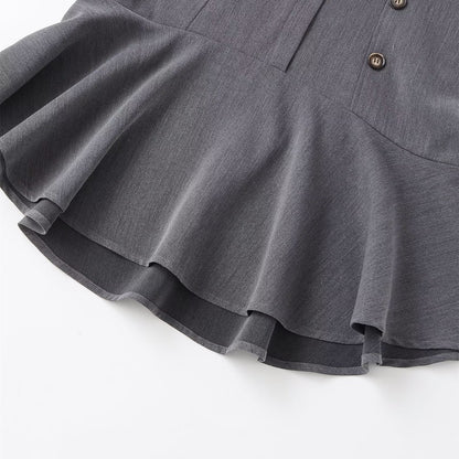 Woman wearing Gray Double Breasted Shoulder Pad Dress in a stylish setting