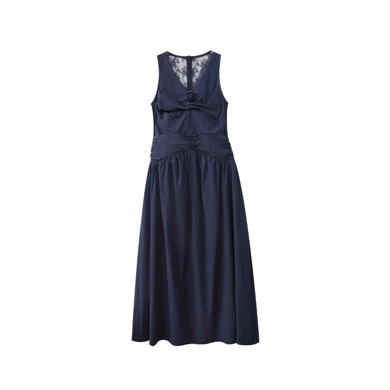 Woman wearing Sleeveless Vest Dress with Floral Detail in a sunny garden