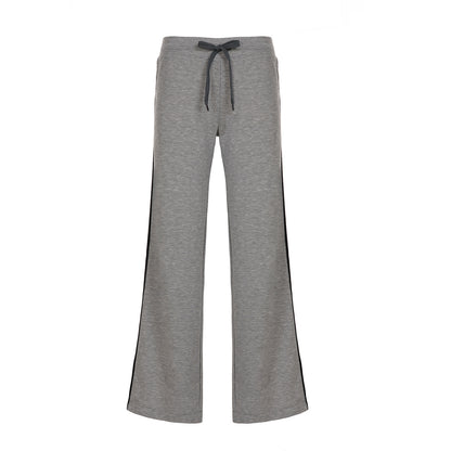 Woman wearing casual loose pants in a relaxed setting