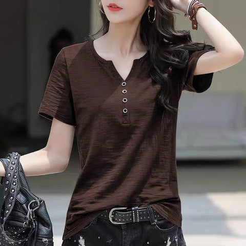 Woman wearing Loose Plus Size V-Neck Short Sleeve Casual T-Shirt in a casual setting