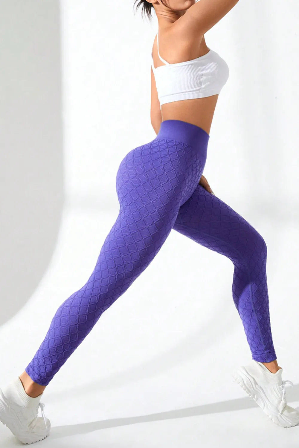 Woman wearing High Waist Active Leggings in a workout setting