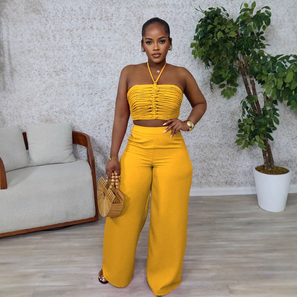 Woman wearing Drawstring Tie-Up Top and High Waist Loose Long Pants Set in a city setting