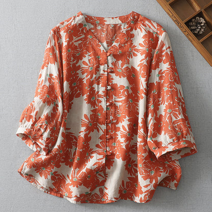 Woman wearing Floral Loose Blouse in a sunny outdoor setting