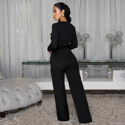 Woman wearing Slimming Belted Long Sleeve Top and Pants Set in a stylish urban setting