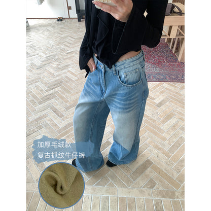 Woman wearing fleece lined wide leg jeans in a casual street setting