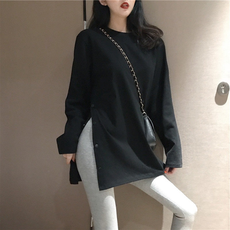 Woman wearing Plus Size Long Sleeve Midi Top in a casual setting