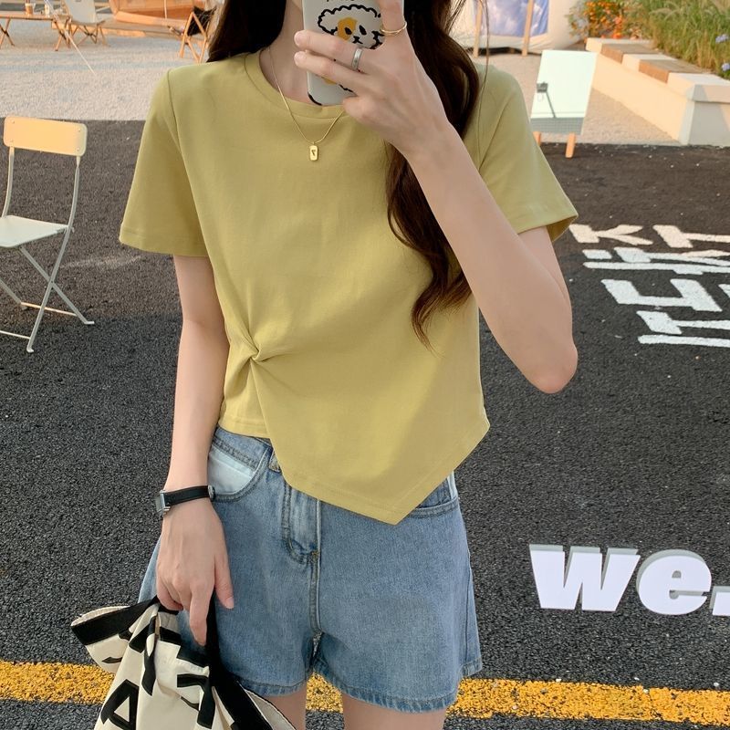 Woman wearing Slim Fit Short Sleeve Crop Top in a casual setting