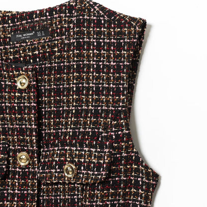 Woman wearing Plaid Belted Textured Vest in a stylish setting
